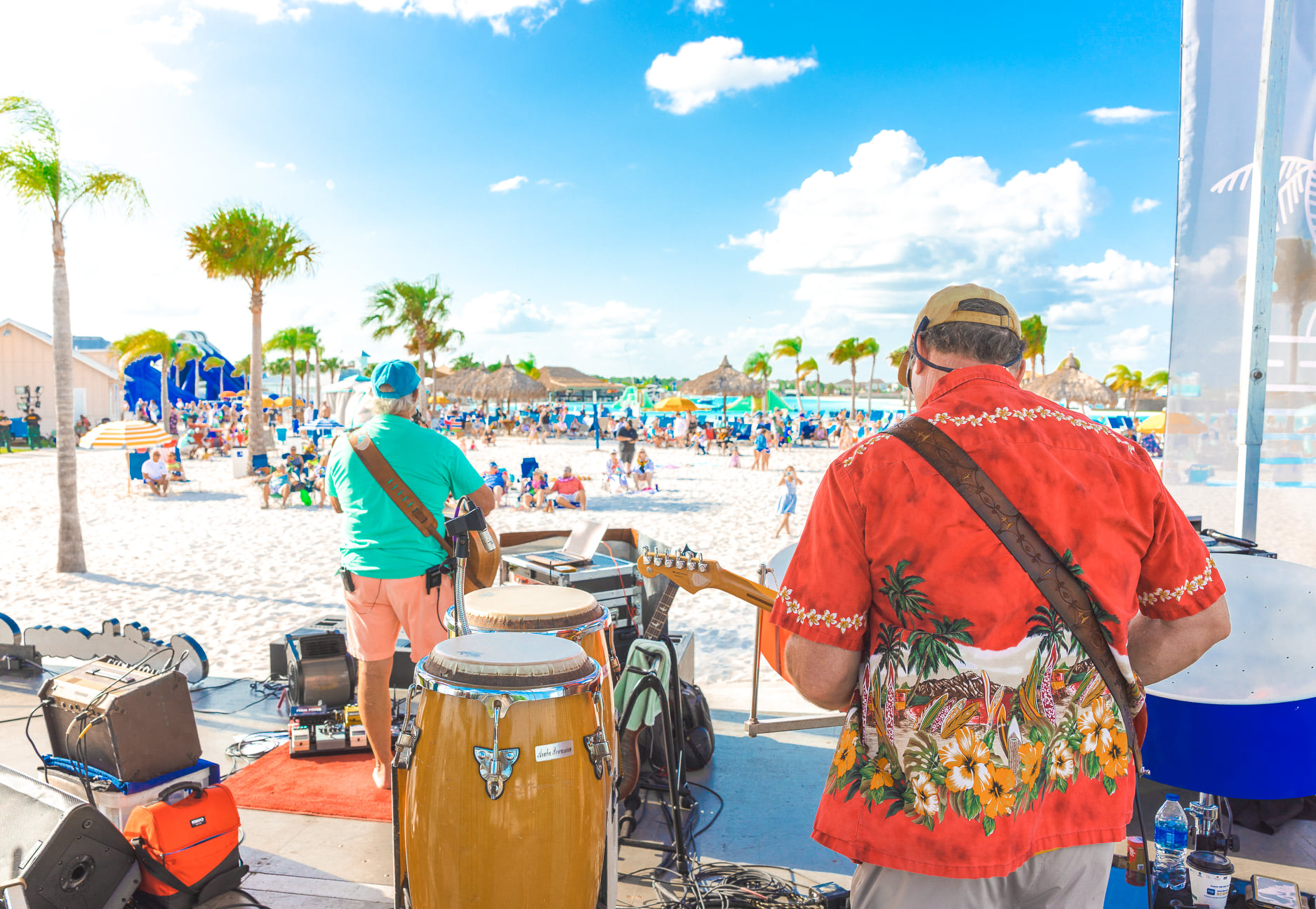 Live music performers playing guitars by Metro Lagoon