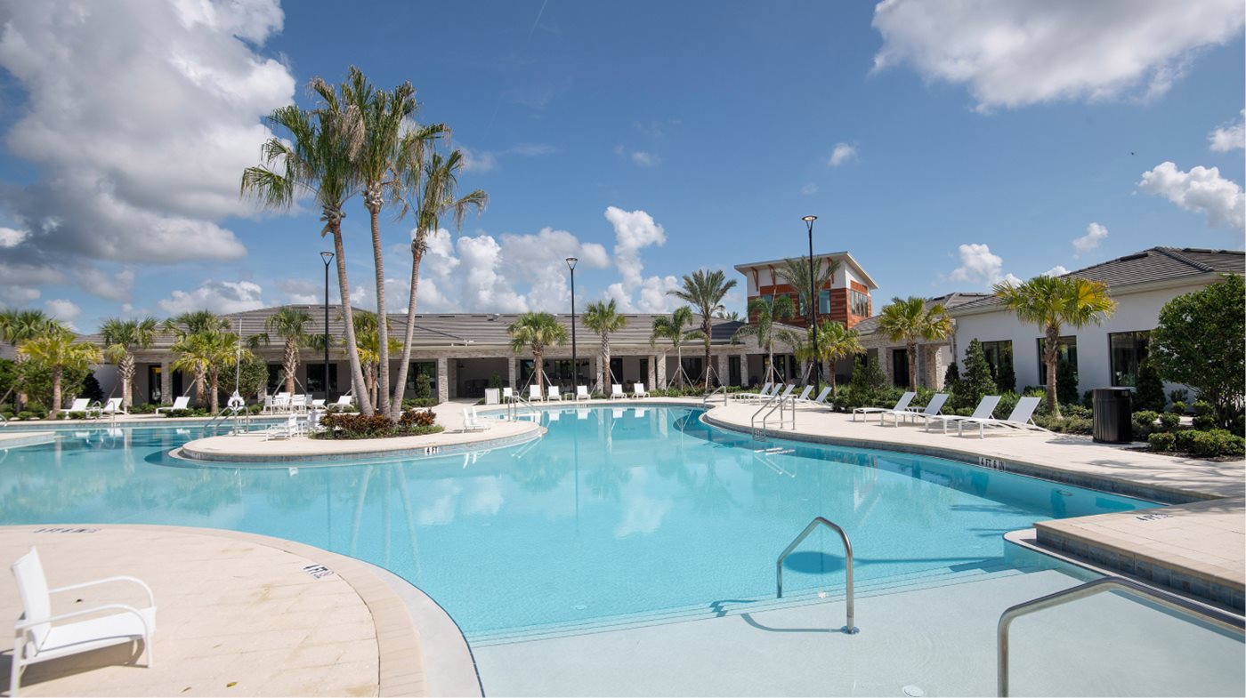 Pool area in Mirada with clubhouse in the background